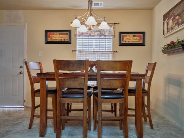 21603 Micheala Way, Humble, TX 77338 - dining area featuring a chandelier and baseboards