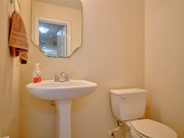 21603 Micheala Way, Humble, TX 77338 - bathroom featuring toilet and a sink