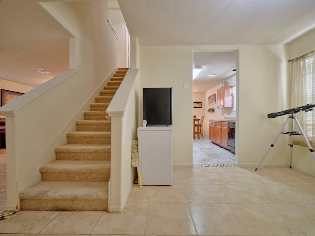 21603 Micheala Way, Humble, TX 77338 - stairs featuring tile patterned floors
