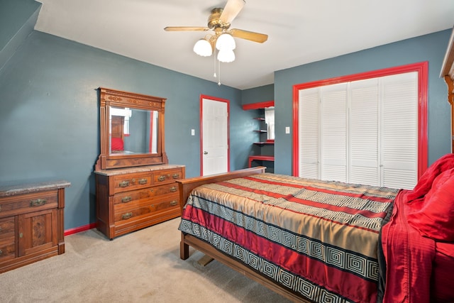111 Whispering Oaks Dr, Seabrook, TX 77586 - bedroom with a closet, light colored carpet, and a ceiling fan