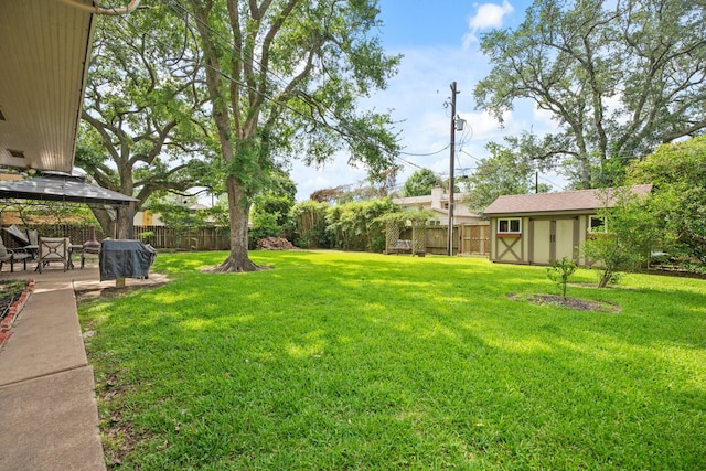 111 Whispering Oaks Dr, Seabrook, TX 77586 - fenced backyard with a gazebo, a storage unit, and a patio