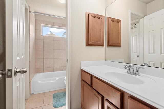 14306 Prosper Ridge Dr, Cypress, TX 77429 - full bathroom featuring vanity, tile patterned floors, and tub / shower combination