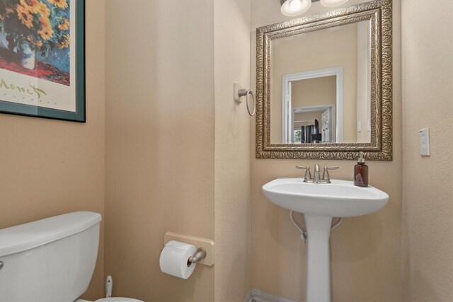 14306 Prosper Ridge Dr, Cypress, TX 77429 - half bath featuring toilet and a sink