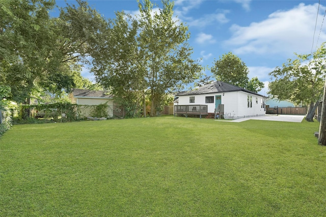 2346 Delafield St, Houston, TX 77023 - fenced backyard featuring a deck and a patio