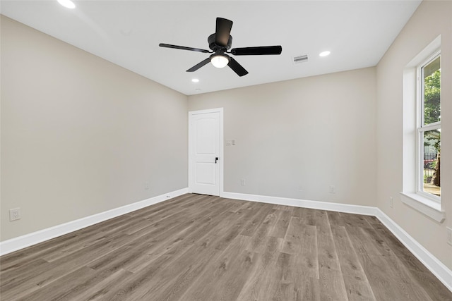 2346 Delafield St, Houston, TX 77023 - spare room with wood finished floors, recessed lighting, and ceiling fan