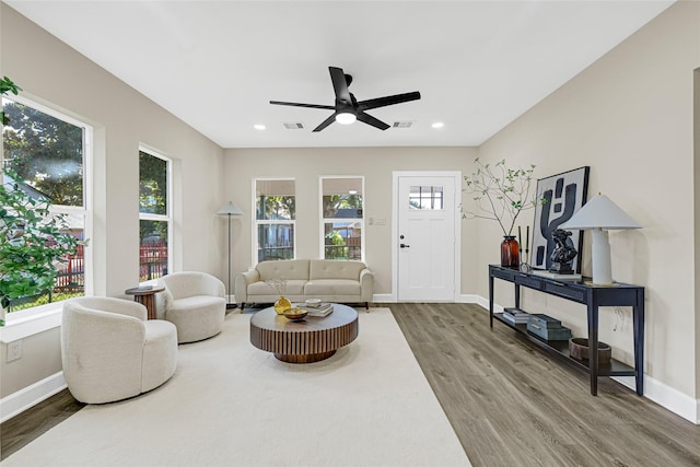 2346 Delafield St, Houston, TX 77023 - living area with wood finished floors, healthy amount of natural light, ceiling fan, and recessed lighting