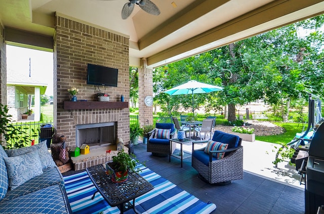 33215 Worthing Ln, Fulshear, TX 77441 - view of patio with an outdoor living space with a fireplace, ceiling fan, and outdoor dining space