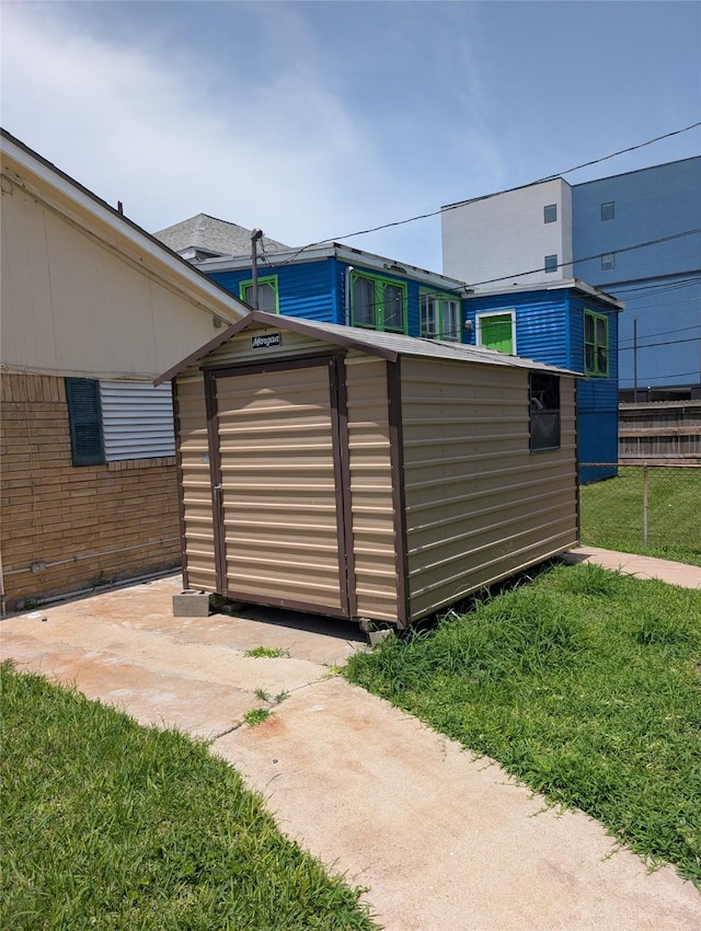 2004 24th St, Galveston, TX 77550 - view of patio featuring a storage unit