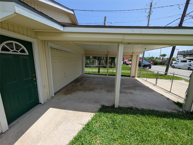 2004 24th St, Galveston, TX 77550 - view of vehicle parking with a garage and concrete driveway