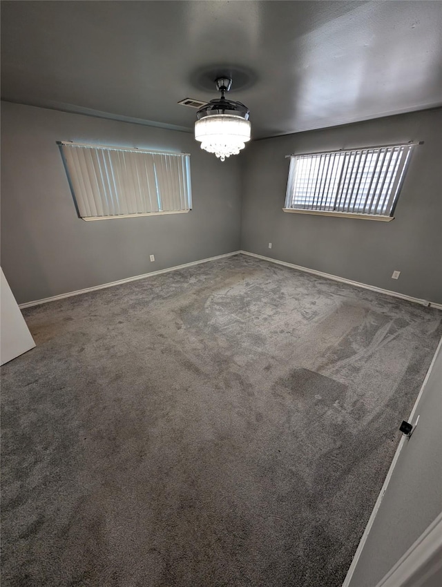 2004 24th St, Galveston, TX 77550 - carpeted spare room with baseboards