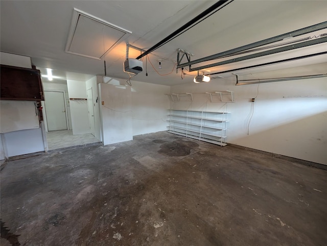 2004 24th St, Galveston, TX 77550 - garage featuring a garage door opener