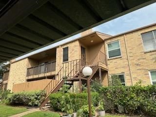 10555 Turtlewood Ct Unit 613, Houston, TX 77072 - view of property featuring stairway