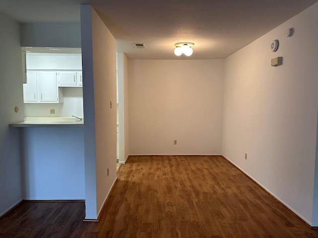 10555 Turtlewood Ct Unit 613, Houston, TX 77072 - empty room with dark wood-style floors