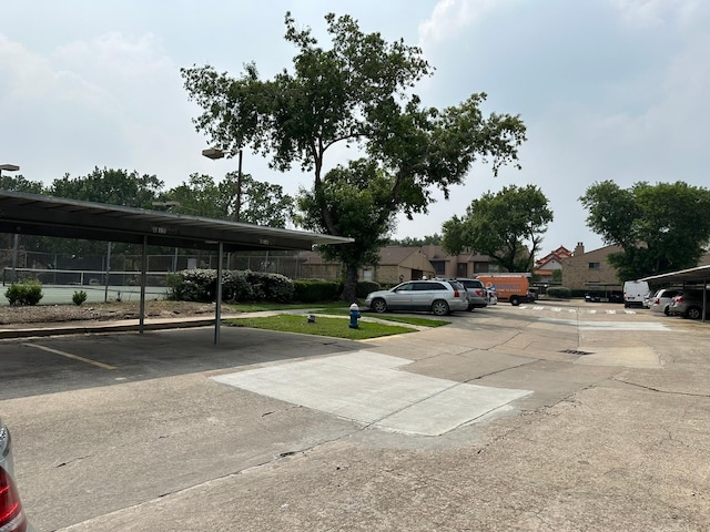 10555 Turtlewood Ct Unit 613, Houston, TX 77072 - view of partially covered parking lot