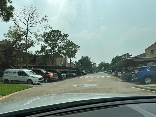 10555 Turtlewood Ct Unit 613, Houston, TX 77072 - view of partially covered parking lot