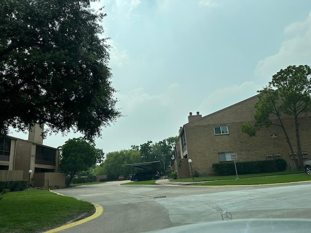 10555 Turtlewood Ct Unit 613, Houston, TX 77072 - view of concrete road with curbs