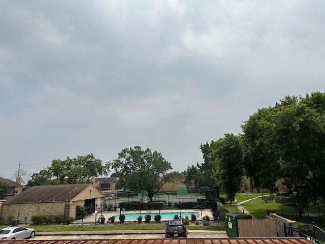 10555 Turtlewood Ct Unit 613, Houston, TX 77072 - view of home's community with a pool