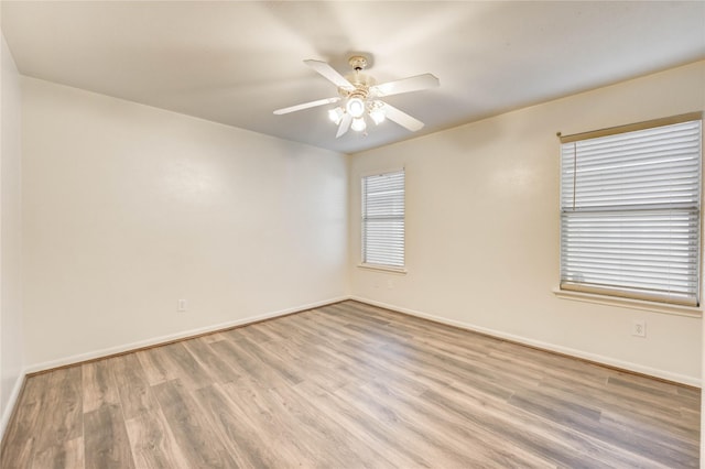 19138 S Whimsey Dr, Cypress, TX 77433 - empty room with wood finished floors and ceiling fan
