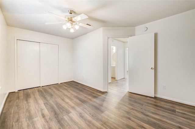 19138 S Whimsey Dr, Cypress, TX 77433 - unfurnished bedroom featuring wood finished floors, ceiling fan, and a closet
