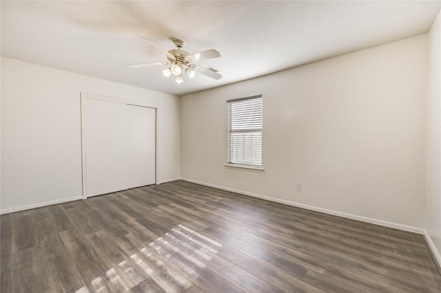 19138 S Whimsey Dr, Cypress, TX 77433 - unfurnished bedroom featuring dark wood finished floors, a closet, and ceiling fan