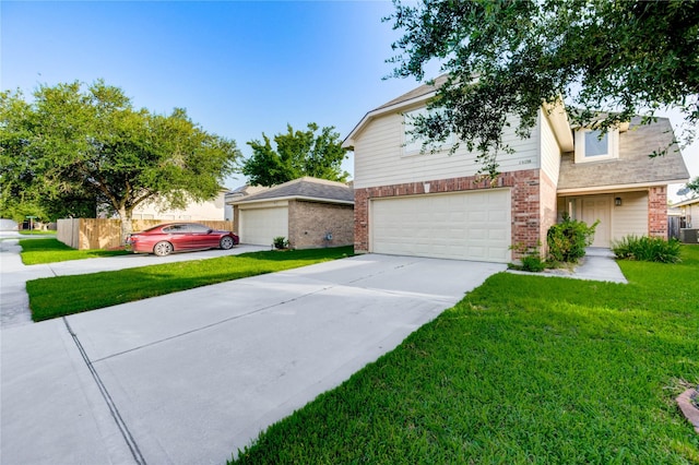 19138 S Whimsey Dr, Cypress, TX 77433 - view of front of house with brick siding, a front lawn, driveway, and a garage