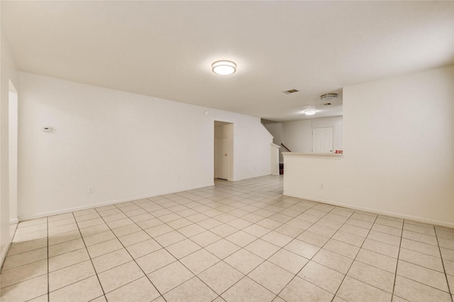 19138 S Whimsey Dr, Cypress, TX 77433 - spare room with stairway and light tile patterned flooring