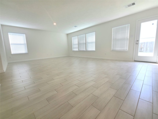 4122 Mossy Bank Ln, Houston, TX 77068 - empty room featuring light wood-style floors and recessed lighting