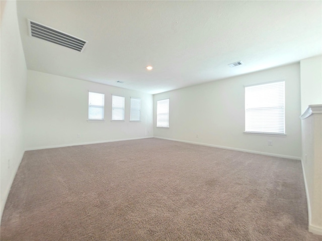 4122 Mossy Bank Ln, Houston, TX 77068 - empty room with light colored carpet and recessed lighting