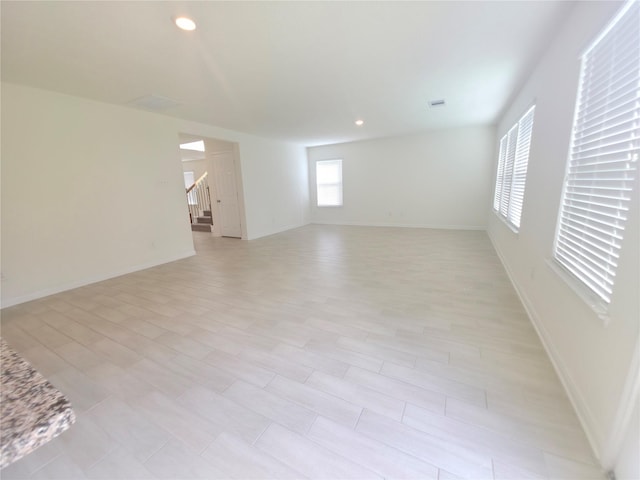 4122 Mossy Bank Ln, Houston, TX 77068 - empty room featuring stairs and recessed lighting