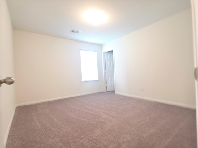 4122 Mossy Bank Ln, Houston, TX 77068 - spare room with carpet and baseboards
