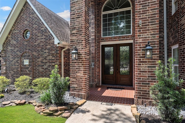 7814 Magnolia Cove Ct, Houston, TX 77346 - entrance to property featuring french doors and brick siding
