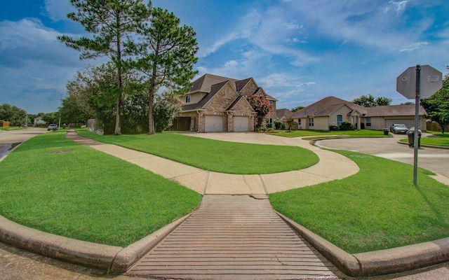 16506 Dawson Mill Ct, Houston, TX 77095 - view of front of home with stone siding, concrete driveway, a front lawn, a garage, and a residential view