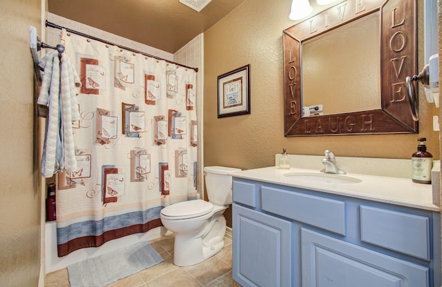 16506 Dawson Mill Ct, Houston, TX 77095 - full bath featuring vanity, a textured wall, and tile patterned floors