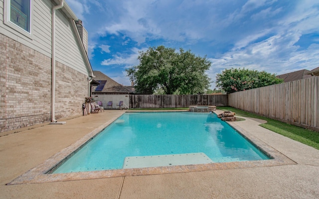 16506 Dawson Mill Ct, Houston, TX 77095 - view of pool featuring a patio, a fenced backyard, and a pool with connected hot tub