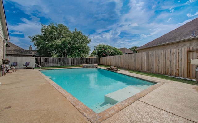 16506 Dawson Mill Ct, Houston, TX 77095 - view of pool with a fenced backyard, a pool with connected hot tub, and a patio