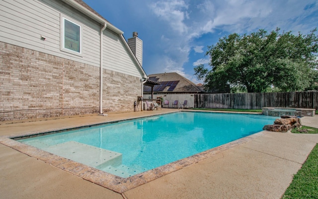 16506 Dawson Mill Ct, Houston, TX 77095 - view of pool with a fenced backyard, a patio area, and a pool with connected hot tub