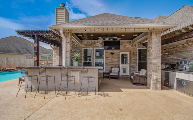 16506 Dawson Mill Ct, Houston, TX 77095 - view of patio / terrace with exterior kitchen and ceiling fan