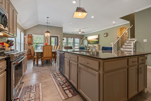 23613 Alder Branch Ln, New Caney, TX 77357 - kitchen with appliances with stainless steel finishes, ornamental molding, healthy amount of natural light, hanging light fixtures, and dark stone countertops