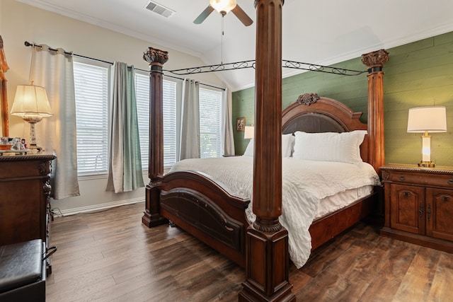 23613 Alder Branch Ln, New Caney, TX 77357 - bedroom featuring multiple windows, dark wood-style flooring, ornamental molding, vaulted ceiling, and ceiling fan