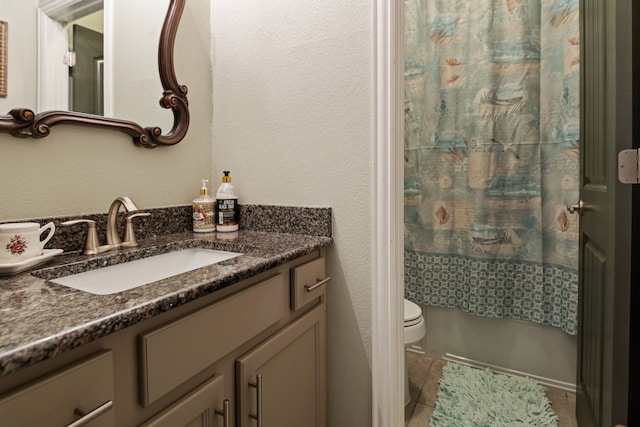 23613 Alder Branch Ln, New Caney, TX 77357 - full bathroom featuring vanity, tile patterned floors, and a textured wall