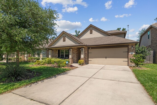 23613 Alder Branch Ln, New Caney, TX 77357 - single story home featuring brick siding, a garage, driveway, a front yard, and roof with shingles