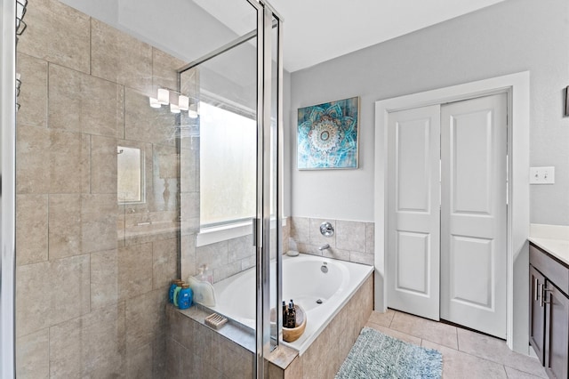 6923 Glenmoor Dr, Rosharon, TX 77583 - full bathroom with a shower stall, a garden tub, vanity, and tile patterned floors
