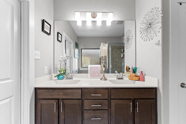 6923 Glenmoor Dr, Rosharon, TX 77583 - bathroom with a shower stall and double vanity