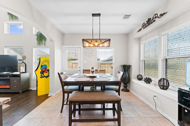 6923 Glenmoor Dr, Rosharon, TX 77583 - dining area with light tile patterned flooring and baseboards