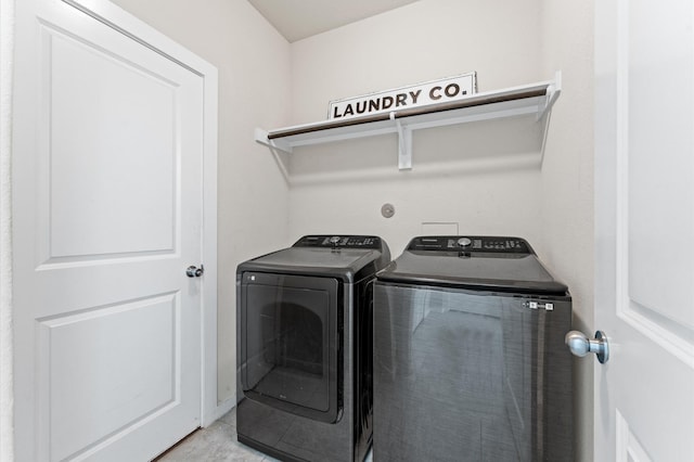 6923 Glenmoor Dr, Rosharon, TX 77583 - washroom featuring washer and dryer and tile patterned floors