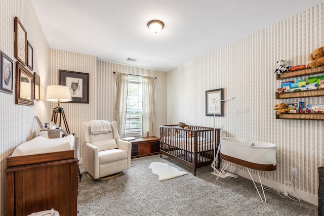 1703 Rosings Way, Katy, TX 77493 - carpeted bedroom featuring wallpapered walls and a crib