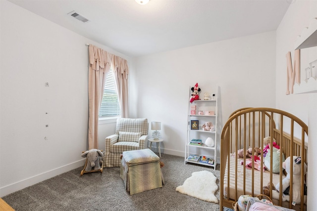 1703 Rosings Way, Katy, TX 77493 - carpeted bedroom featuring a nursery area and baseboards