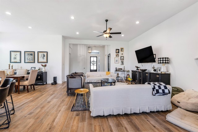 1703 Rosings Way, Katy, TX 77493 - living area featuring light wood-style floors, a ceiling fan, and recessed lighting