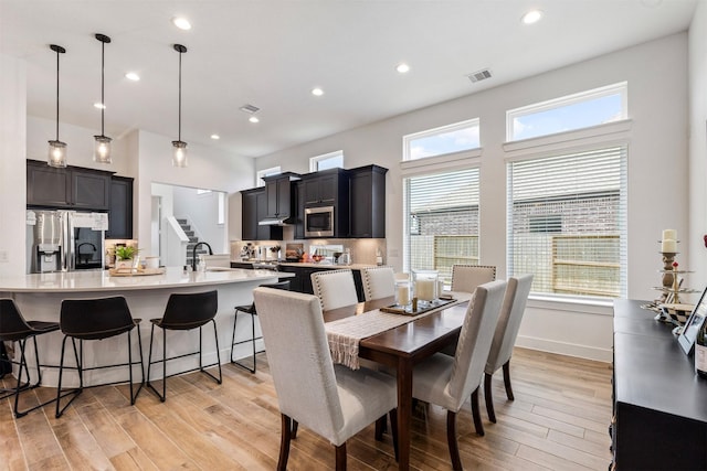 1703 Rosings Way, Katy, TX 77493 - dining area featuring light wood-style floors and recessed lighting
