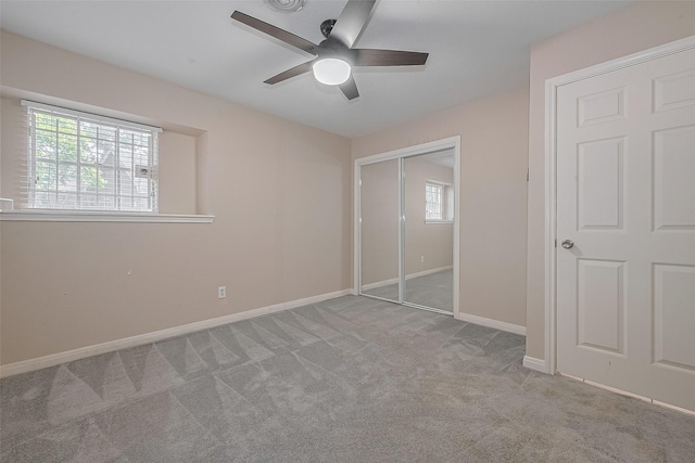 7230 Redding Rd, Houston, TX 77036 - unfurnished bedroom with carpet floors, a closet, and a ceiling fan